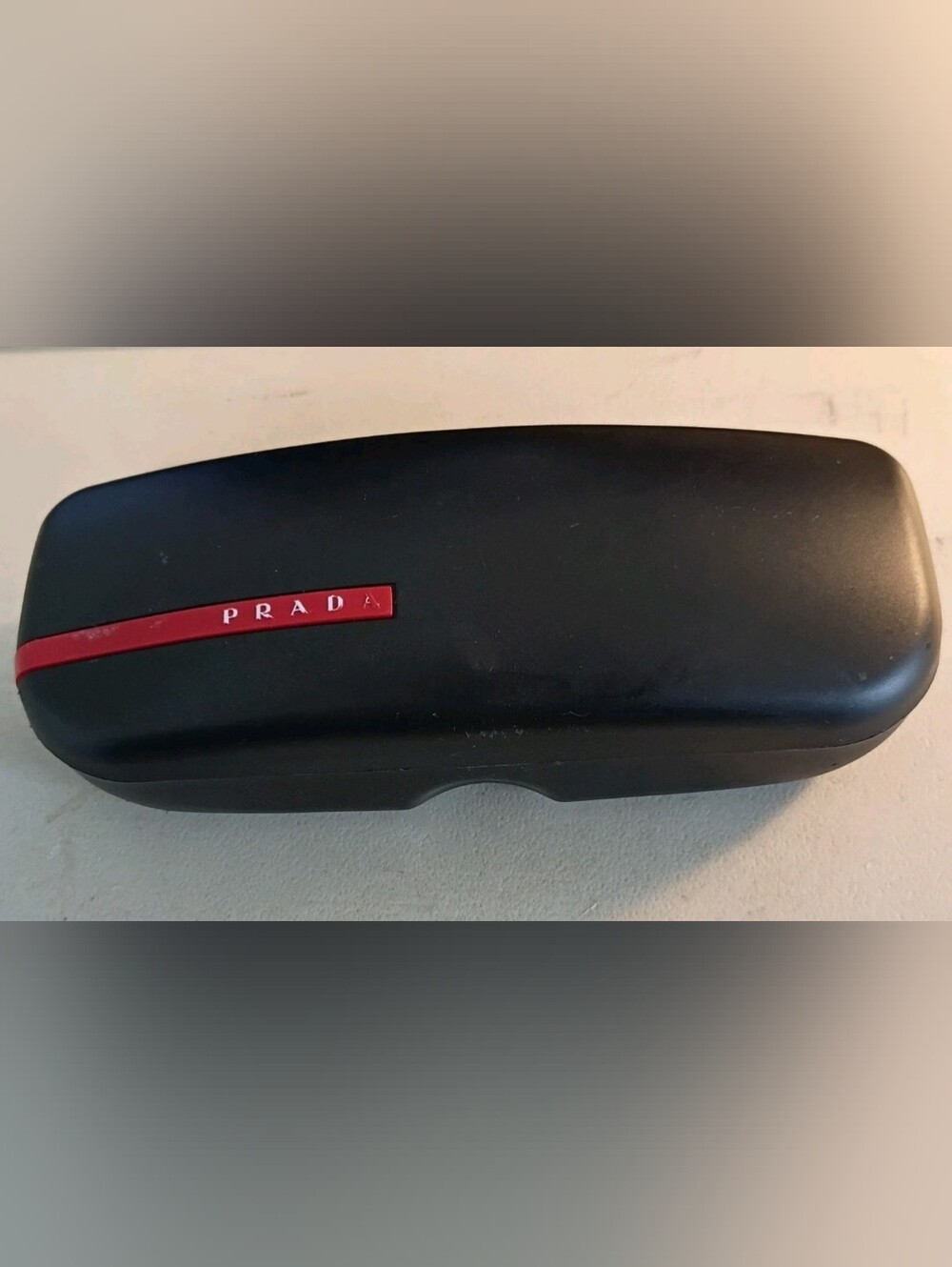 Prada Black Hard Shell Sunglasses Case with Red Logo Stripe